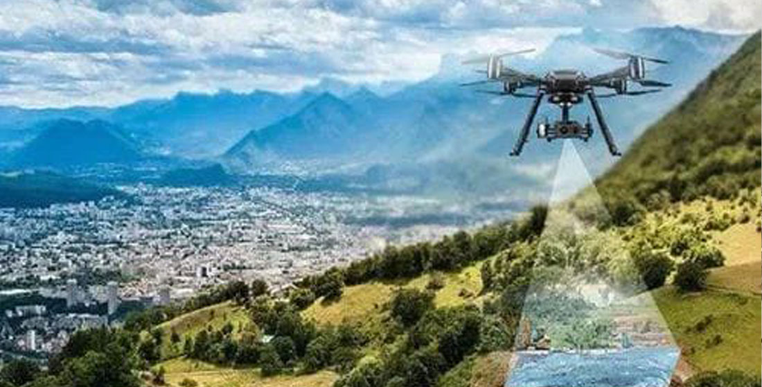 Aerial Survey & Mapping — Multirotor drone over terrain